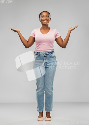 Image of happy african american woman celebrating success