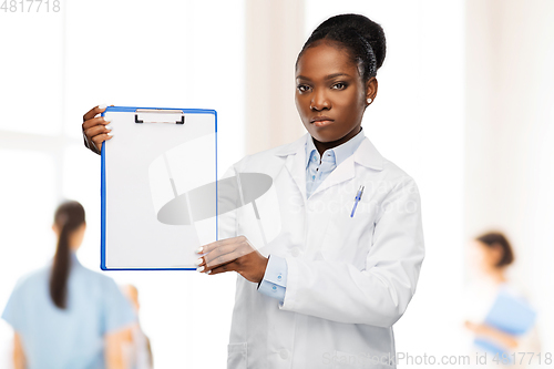 Image of african american female doctor with clipboard