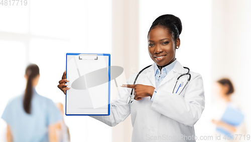 Image of african american female doctor with clipboard