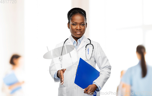 Image of happy african american female doctor or scientist