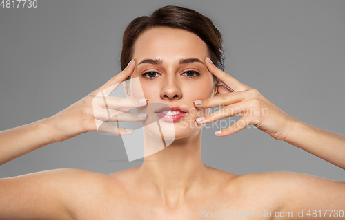 Image of beautiful young woman with bare shoulder