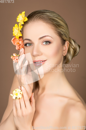 Image of beautiful girl with flowers on head