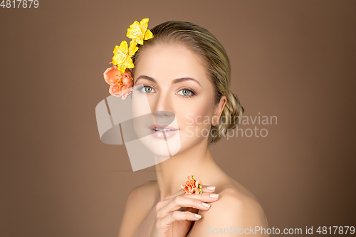 Image of beautiful girl with flowers on head