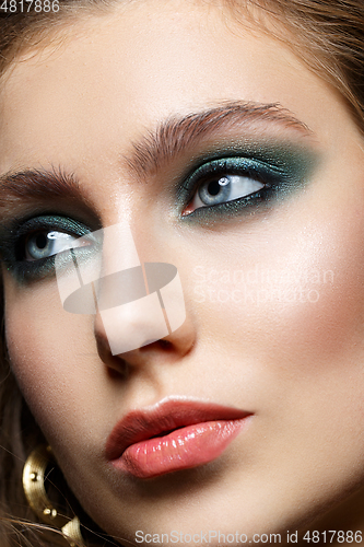 Image of beautiful girl with green smoky eyes