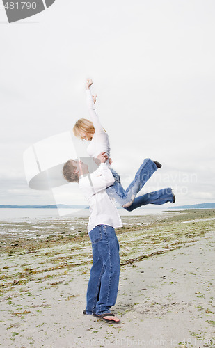 Image of Caucasian couple on the beach