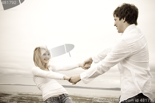 Image of Caucasian couple on the beach