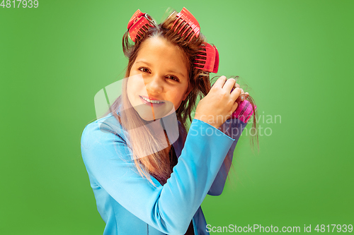 Image of Teen girl dreaming about future profession of makeup artist