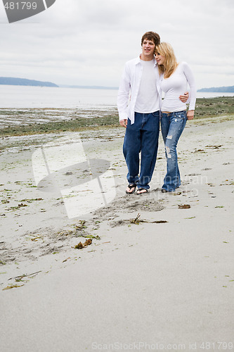 Image of Caucasian couple in love on the beach