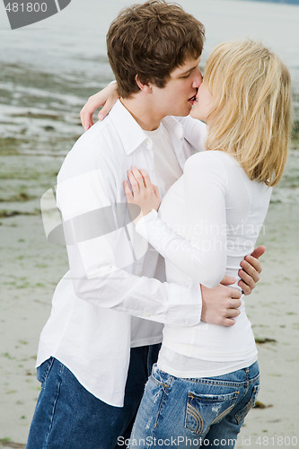 Image of Caucasian couple kissing