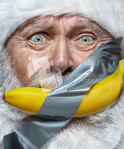 Image of Man and modern art - bearded Santa transformed in art object