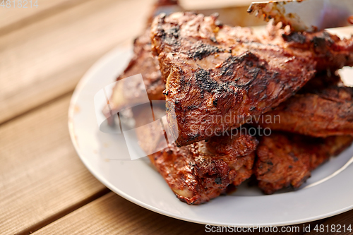 Image of grilled barbecue meat stack on plate