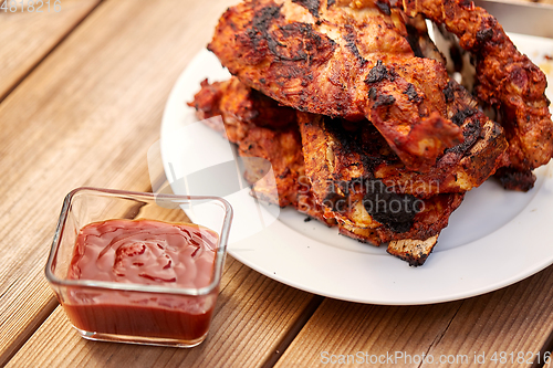 Image of grilled barbecue meat stack on plate
