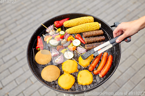 Image of barbecue kebab meat and vegetables on grill