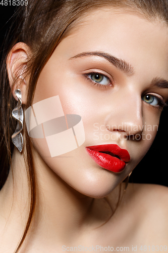 Image of beautiful girl with red lips