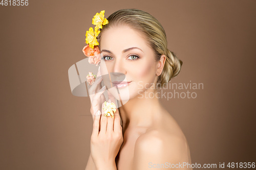 Image of beautiful girl with flowers on head