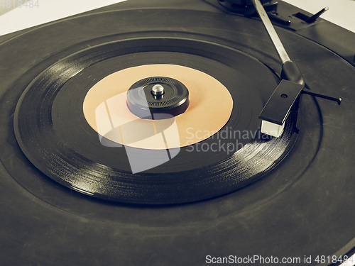 Image of Vintage looking Vinyl record on turntable