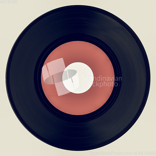 Image of Vintage looking Vinyl record with pink label