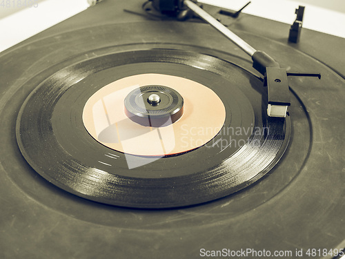 Image of Vintage looking Vinyl record on turntable