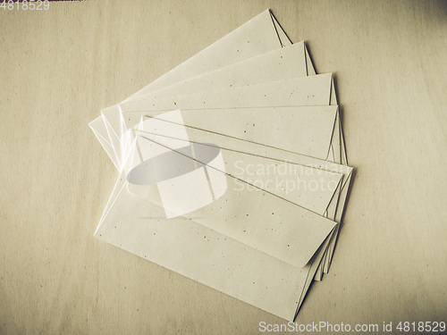 Image of Vintage looking Letter envelope on wood table