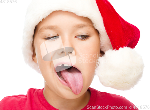 Image of Little girl in santa hat