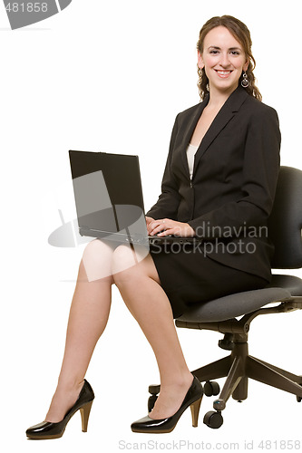 Image of Woman working on laptop