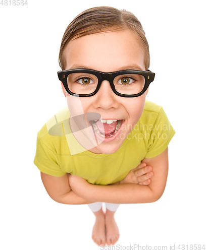 Image of Portrait of a happy little girl wearing glasses