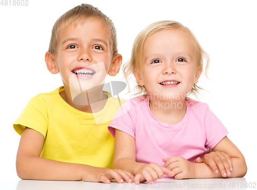 Image of Portrait of a cute little girl and boy