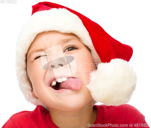 Image of Little girl in santa hat