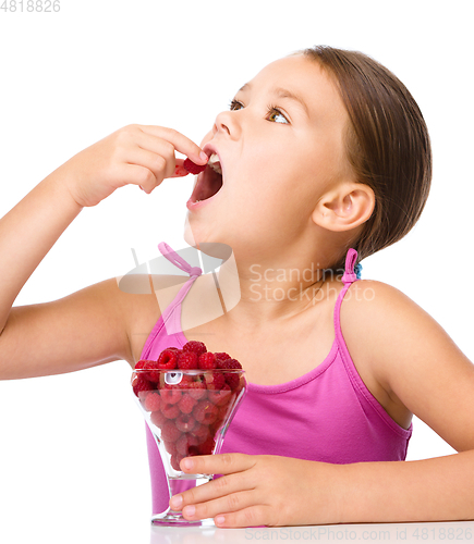 Image of Little girl with raspberries