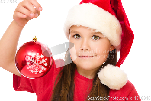 Image of Young happy woman in christmas cloth