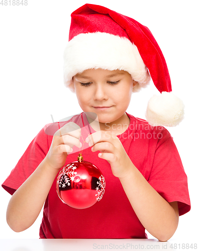 Image of Young happy girl in christmas cloth