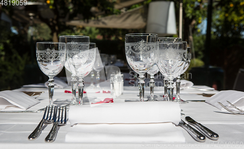 Image of Close up detail of elegant served table outdoors.