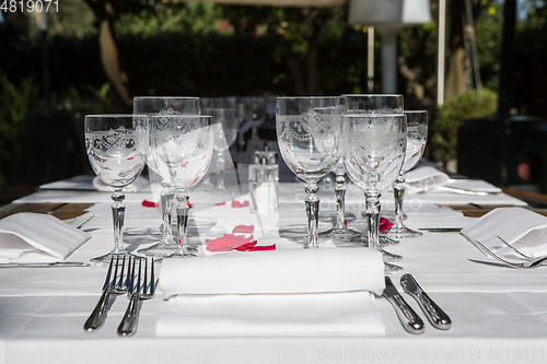 Image of Close up detail of elegant served table outdoors.