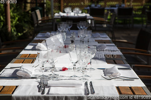 Image of Close up detail of elegant served table outdoors.