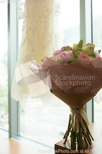 Image of beautiful modern wedding bouquet on white table