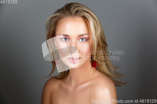 Image of beautiful girl with natural makeup and long hair