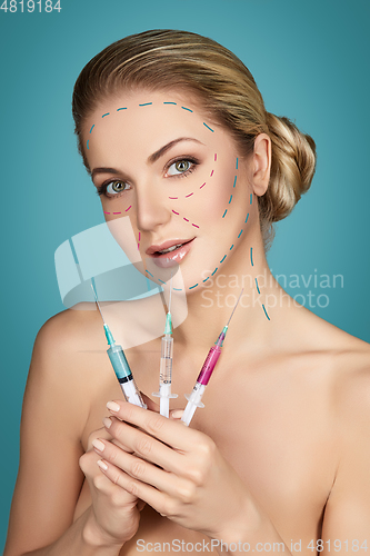 Image of beautiful girl getting beauty injections