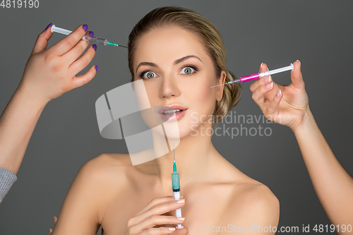 Image of beautiful girl getting beauty injections