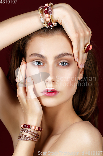 Image of beautiful girl with natural makeup and long hair