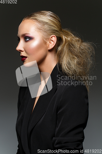 Image of beautiful blond girl with dark makeup