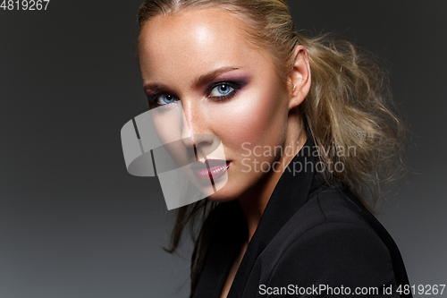 Image of beautiful blond girl with dark makeup