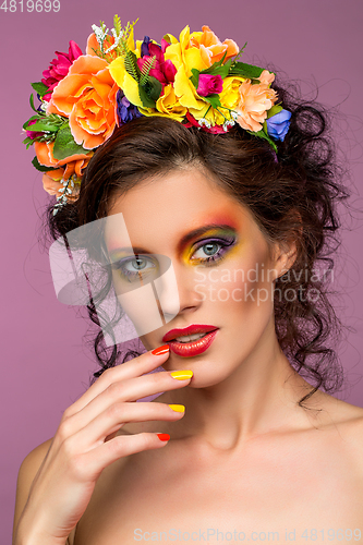 Image of beautiful girl with flower accessories