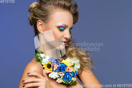 Image of beautiful girl with flower accessories