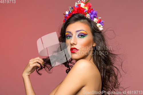 Image of beautiful girl with flower accessories