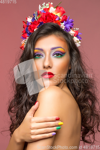 Image of beautiful girl with flower accessories