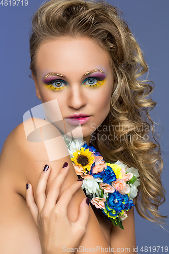 Image of beautiful girl with flower accessories