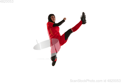 Image of Arabian female soccer or football player isolated on white studio background