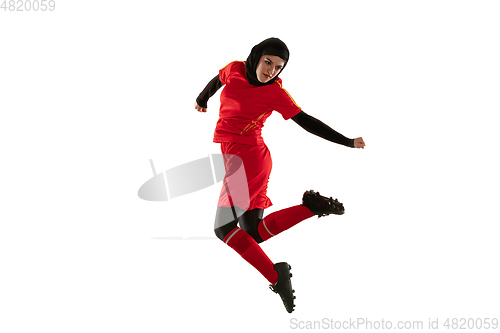 Image of Arabian female soccer or football player isolated on white studio background