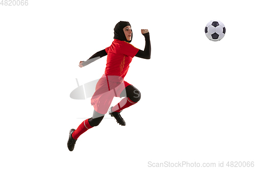 Image of Arabian female soccer or football player isolated on white studio background