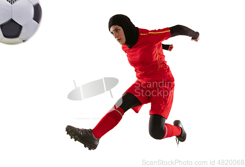 Image of Arabian female soccer or football player isolated on white studio background